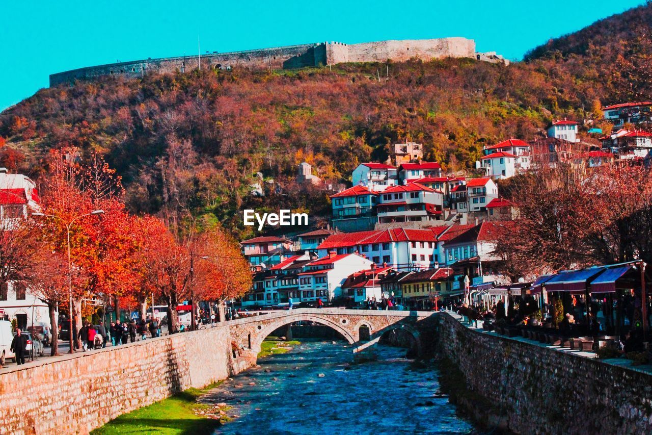 View of bridge over river during autumn