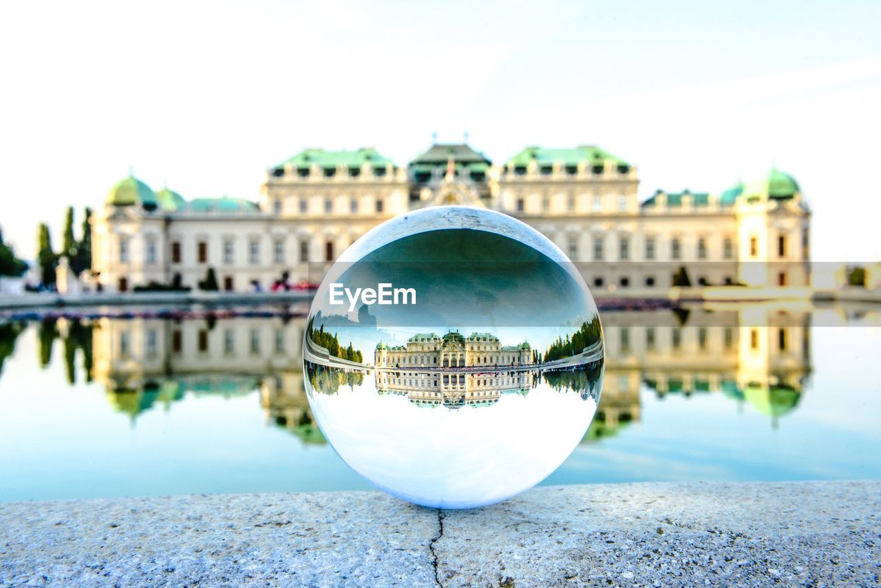 CLOSE-UP OF WATER DROP ON A CITY