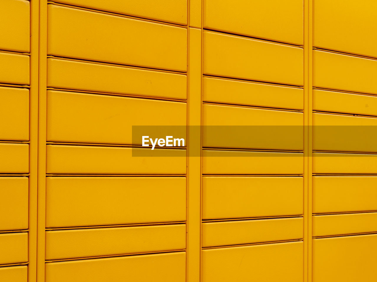 full frame shot of orange wall