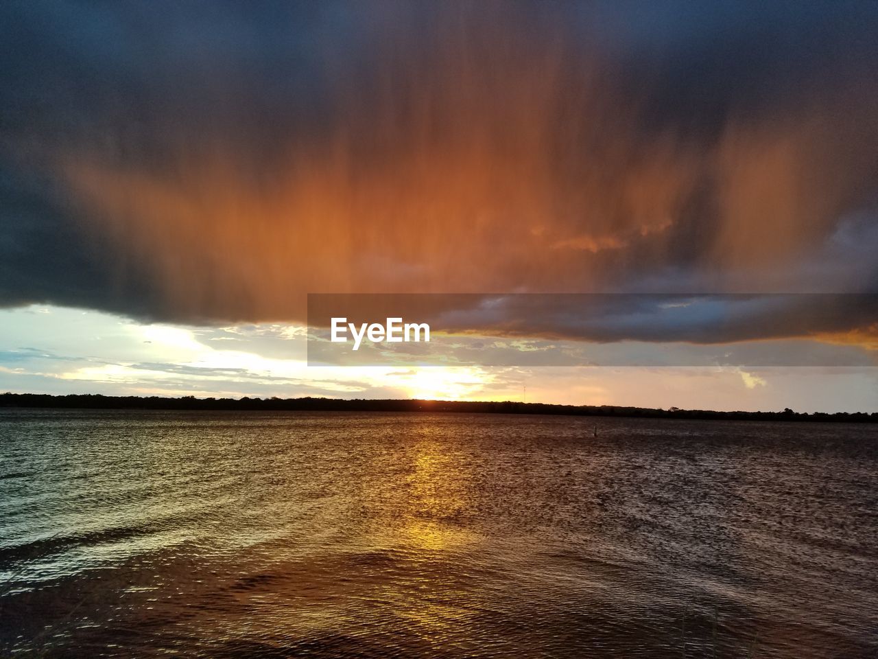 Scenic view of landscape at sunset