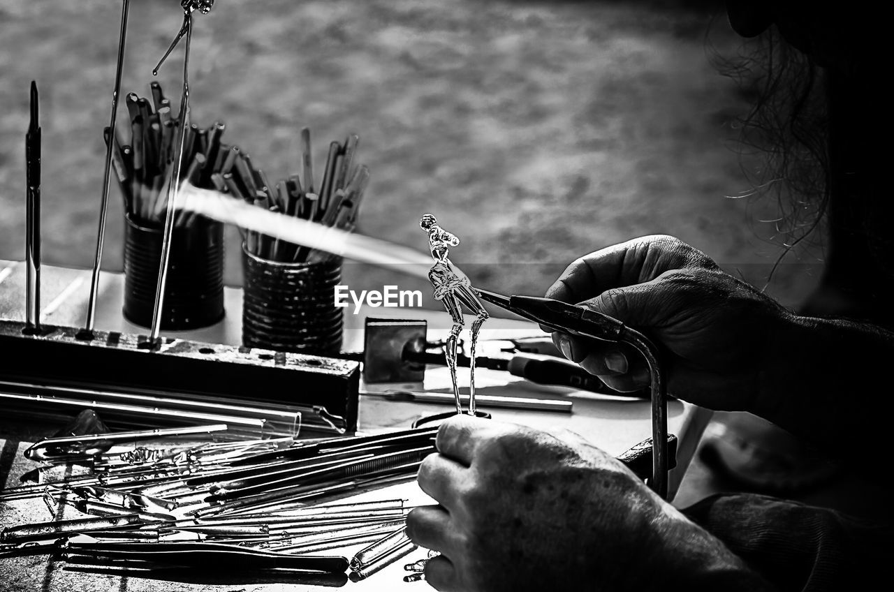 MAN WORKING IN SHOPPING CART