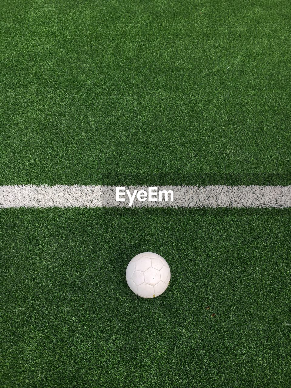 High angle view of golf ball on field