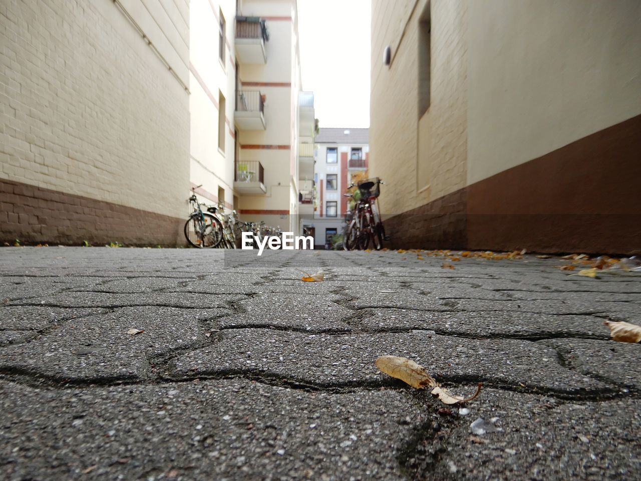 Surface level of footpath amidst buildings