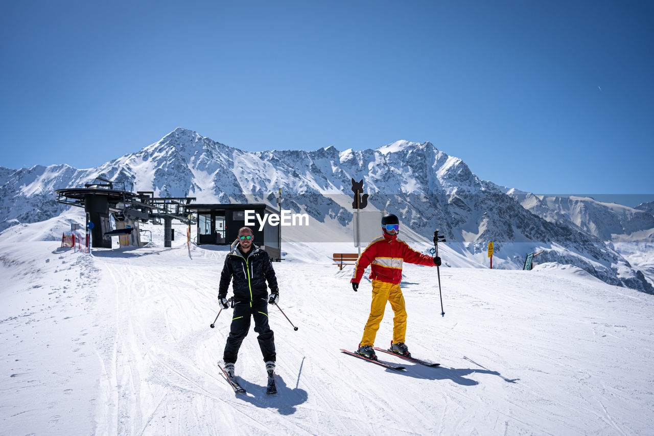 Father with 2 sons in ski trip in tirol, men's trip