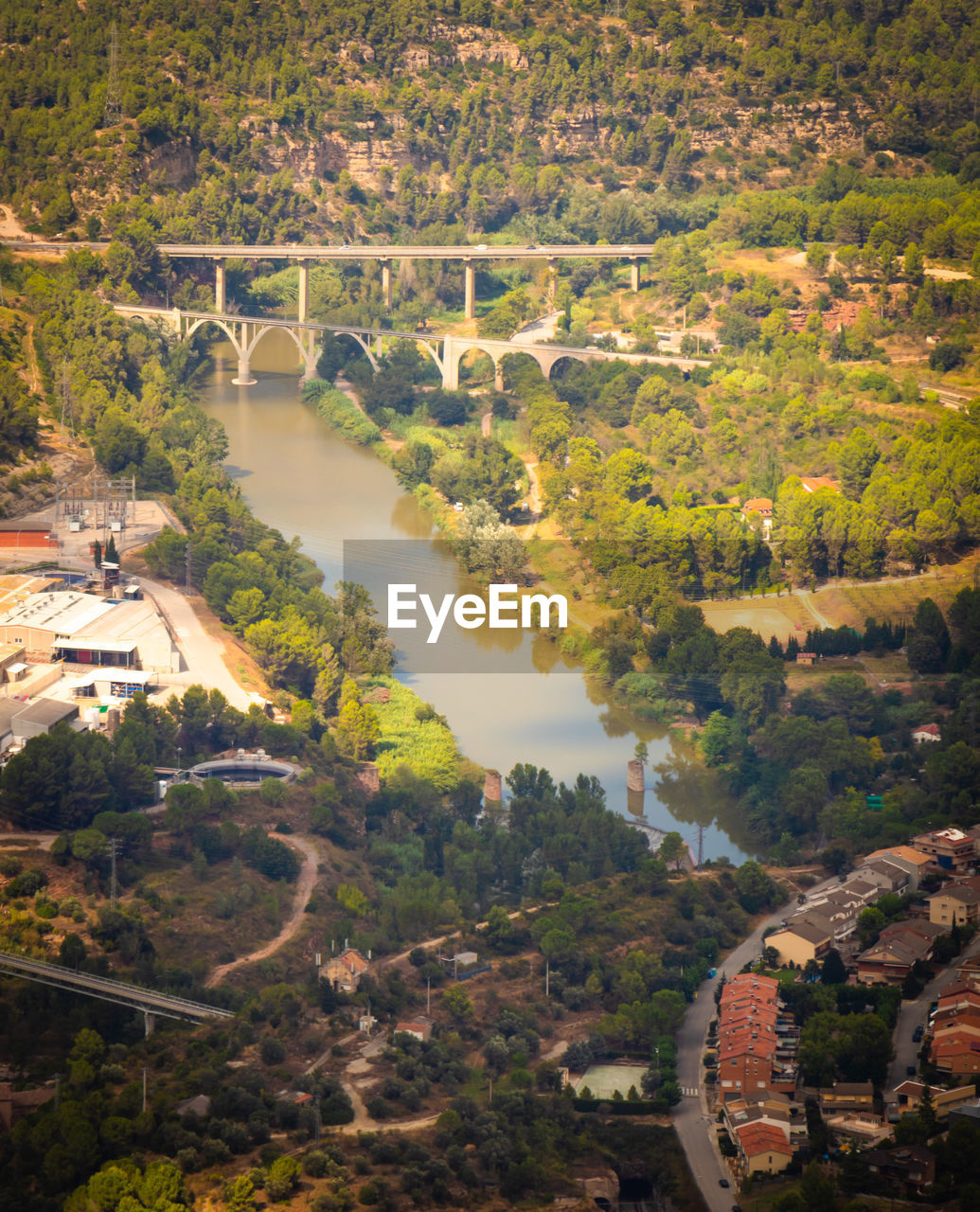 HIGH ANGLE VIEW OF TREES AND BUILDINGS