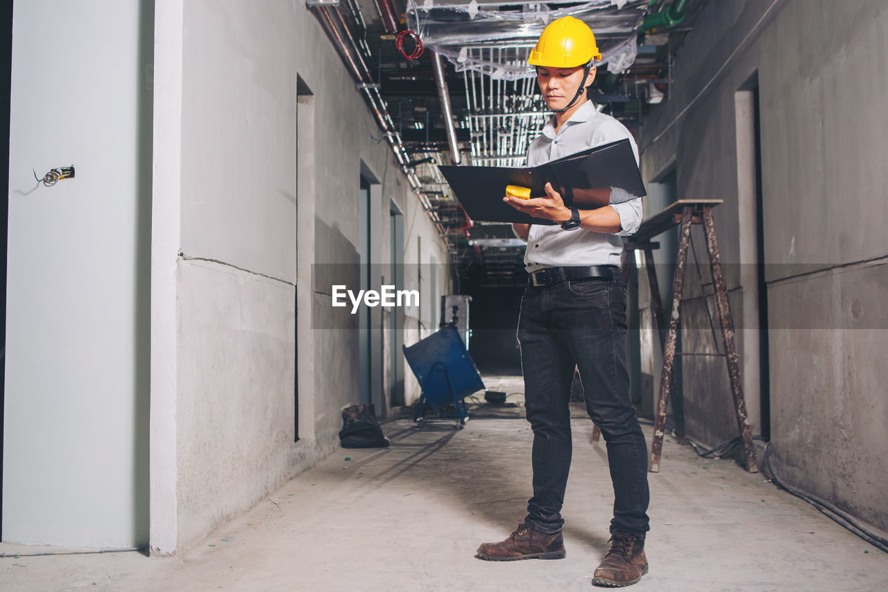 Project engineer, engineer and technician working on construction site