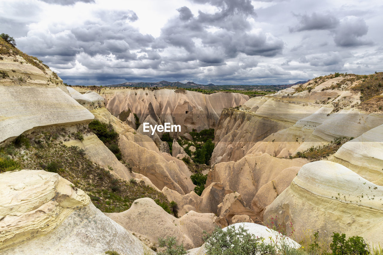 View of the red valley in turkey with cloudy sky.