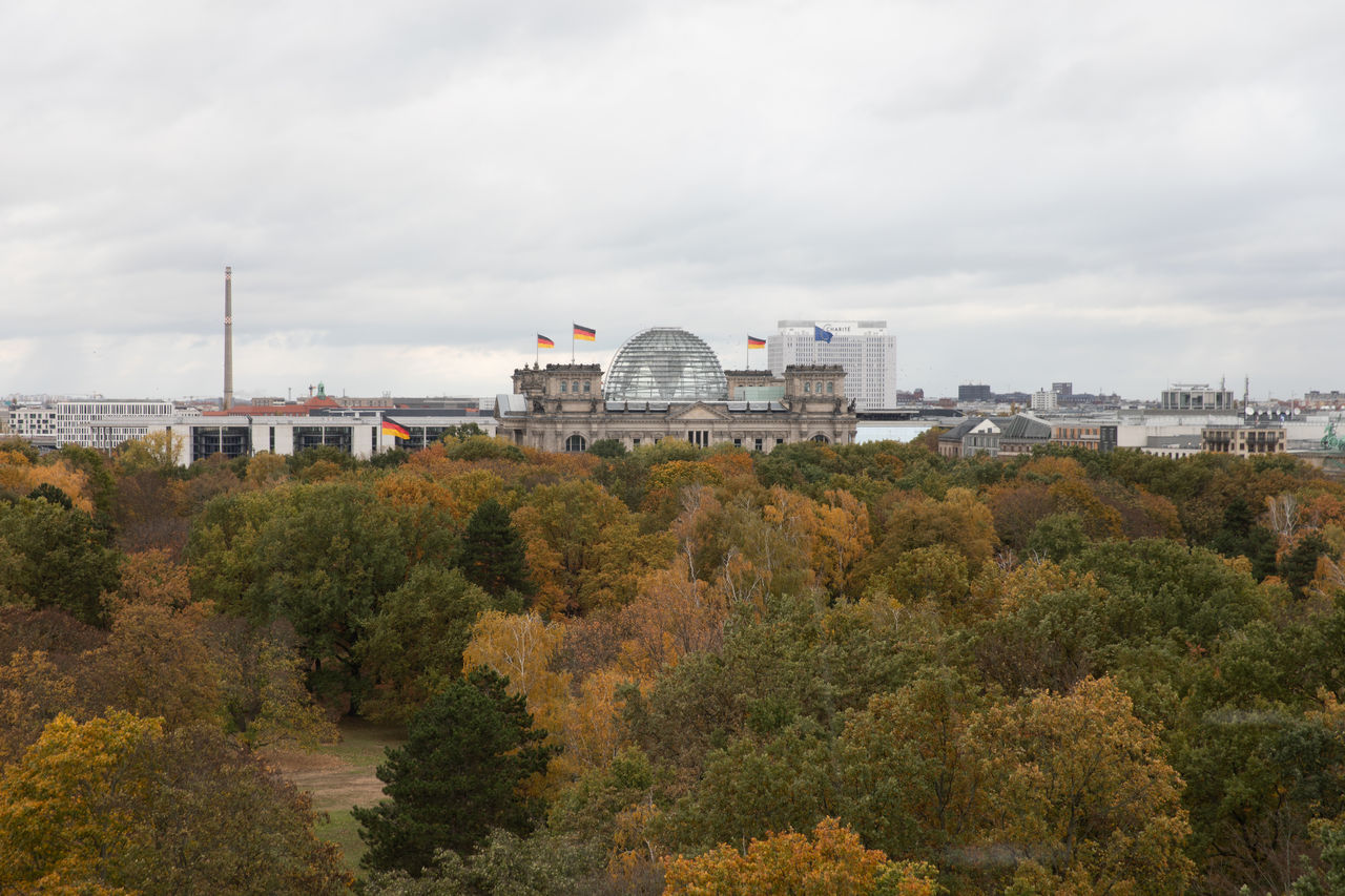 High angle view of buildings in city against sky