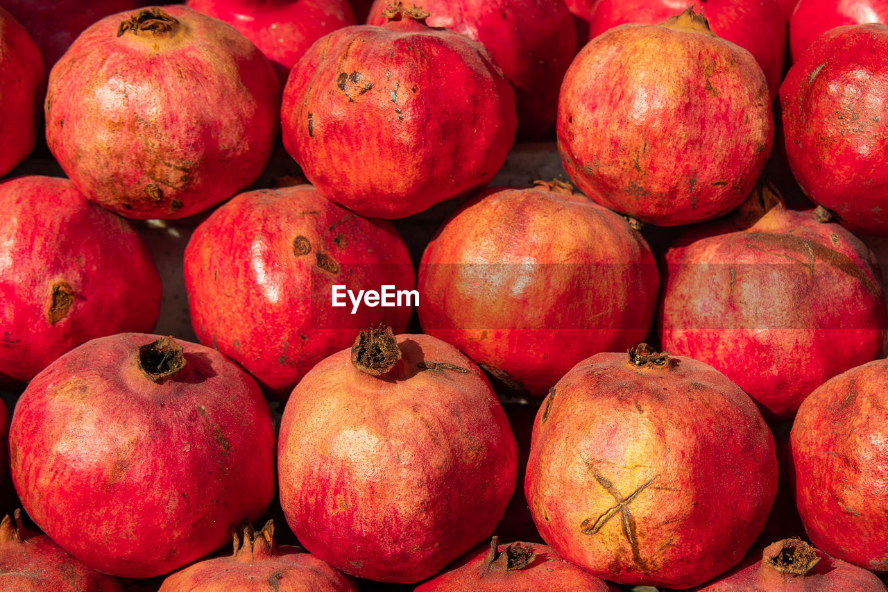 Full frame shot of pomegranates for sale at market