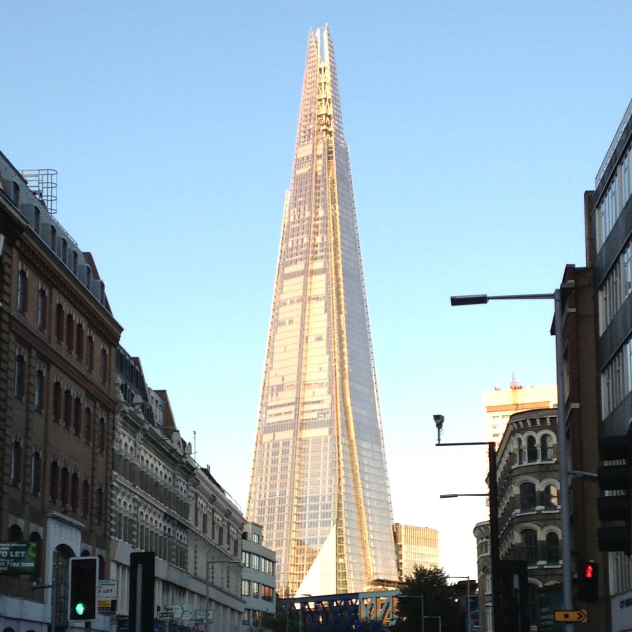 LOW ANGLE VIEW OF BUILDINGS AGAINST SKY