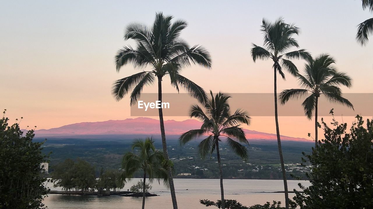 Scenic view of sea at sunset