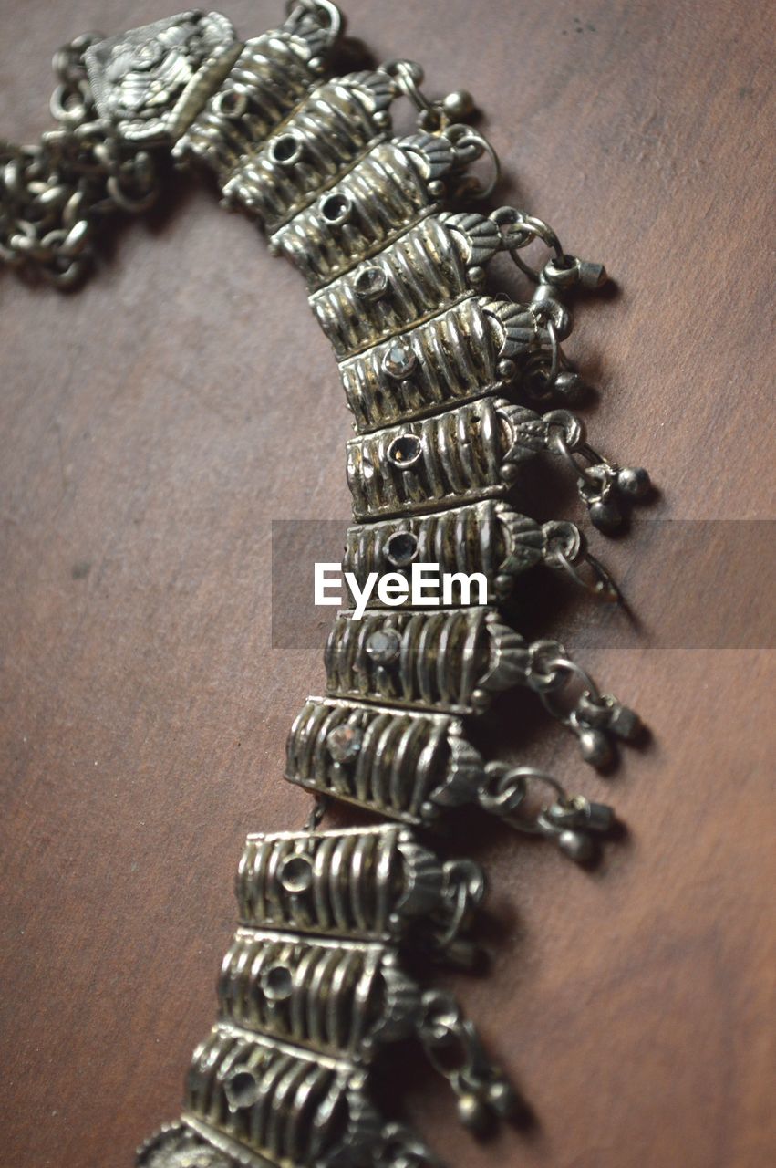 Close-up of necklace on table