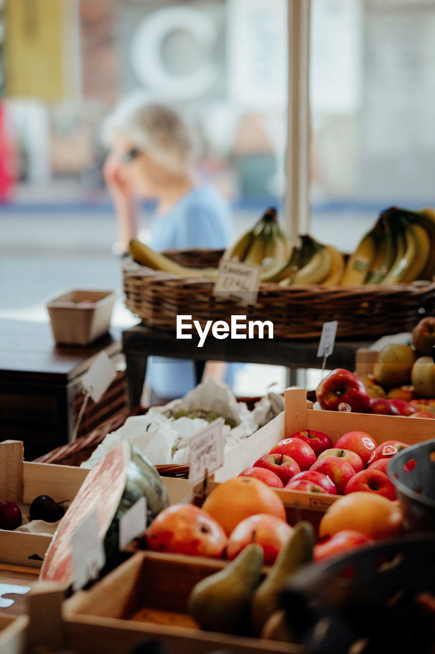 food and drink, food, healthy eating, meal, fruit, freshness, wellbeing, retail, market, container, basket, business, vegetable, selective focus, brunch, day, adult, person, indoors, women, variation, abundance, one person, market stall, tomato, large group of objects