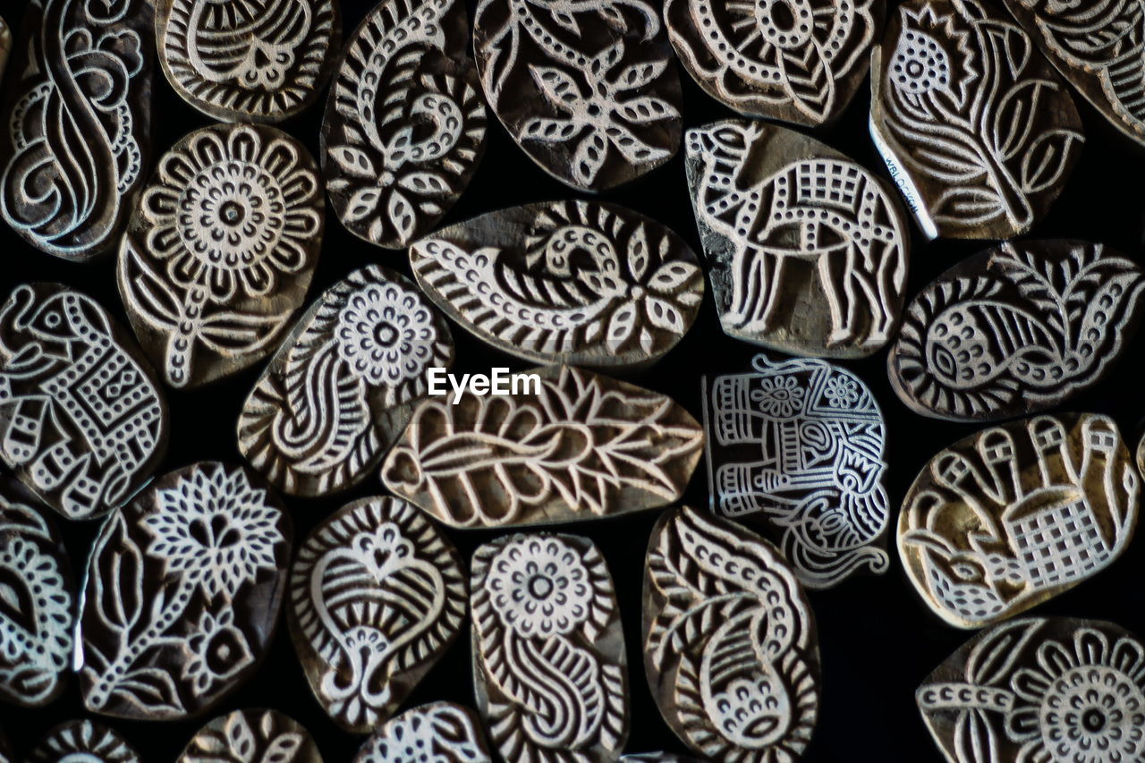 Full frame shot of symbols against black background