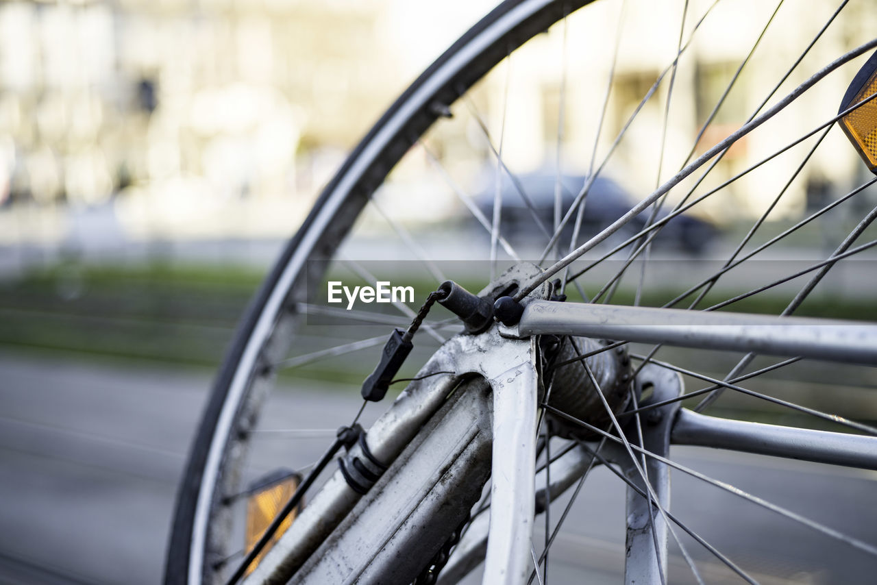 Cropped image of bicycle on road