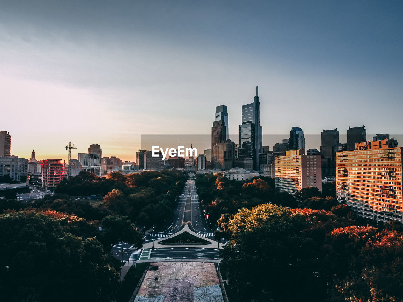 Aerial view of modern buildings in city against sky on a morning in philadelphia