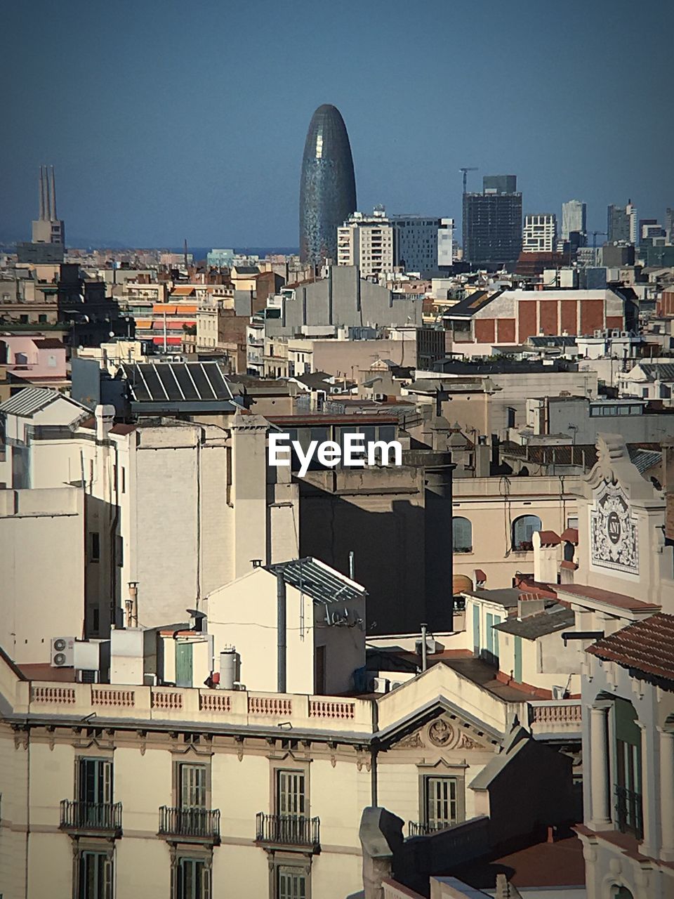 BUILDINGS IN CITY AGAINST SKY