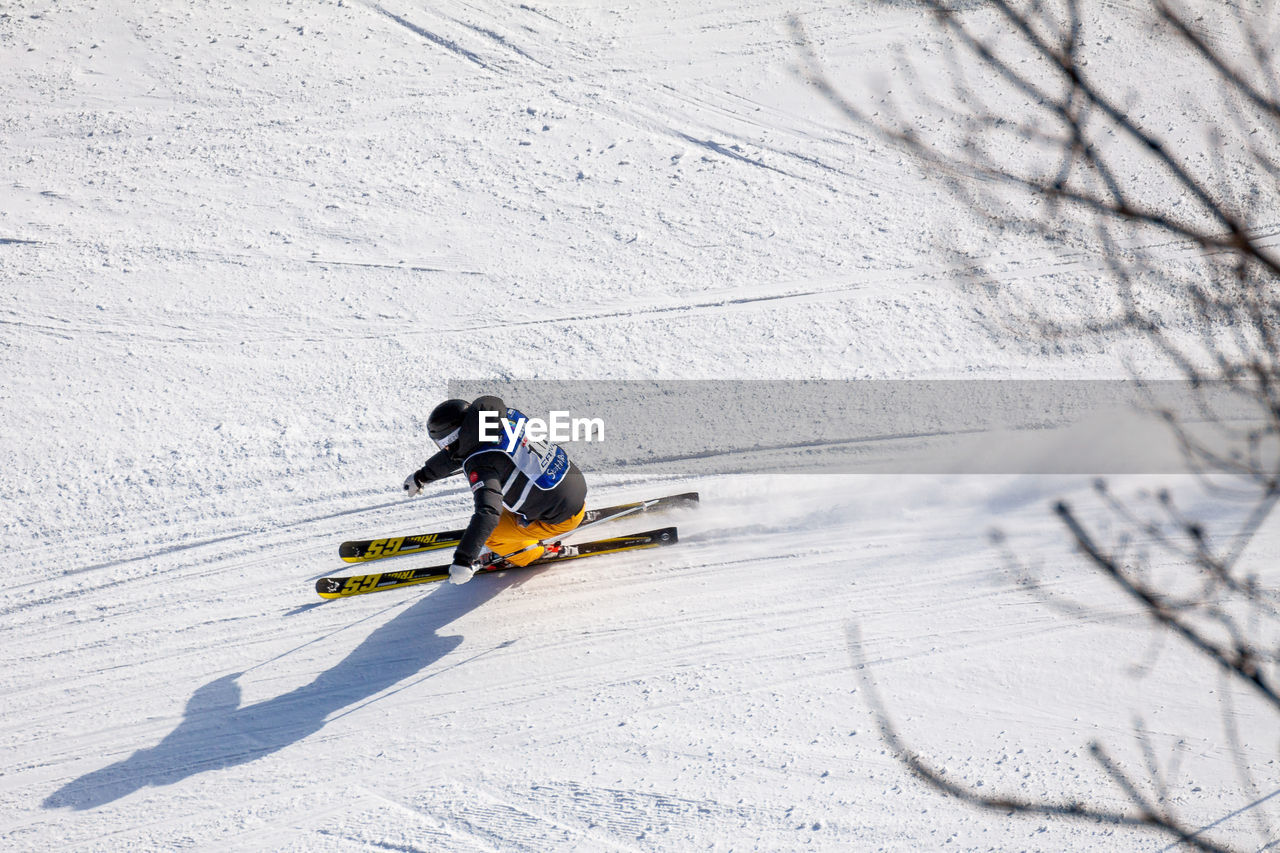 PERSON SKIING IN SNOW