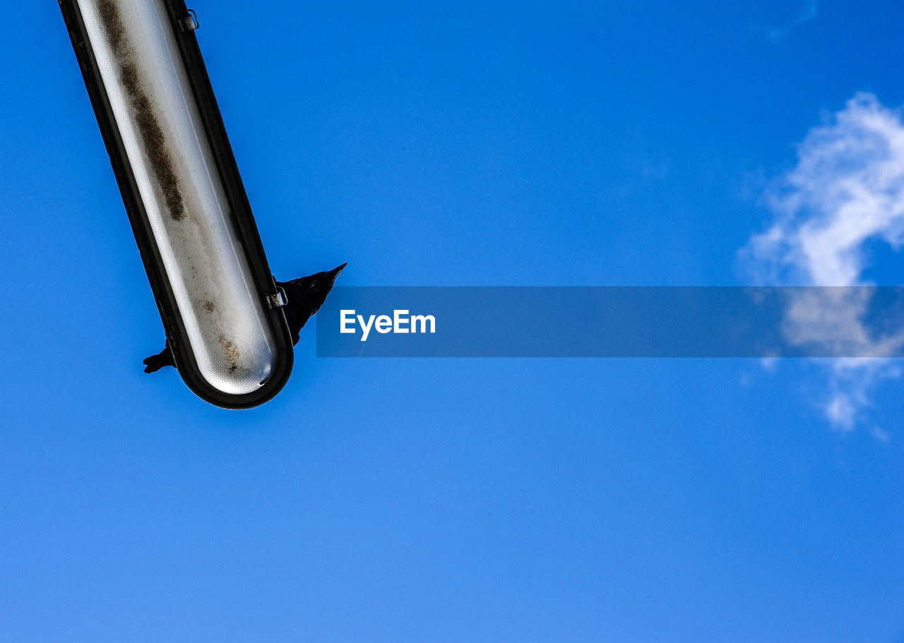 LOW ANGLE VIEW OF A AIRPLANE IN SKY