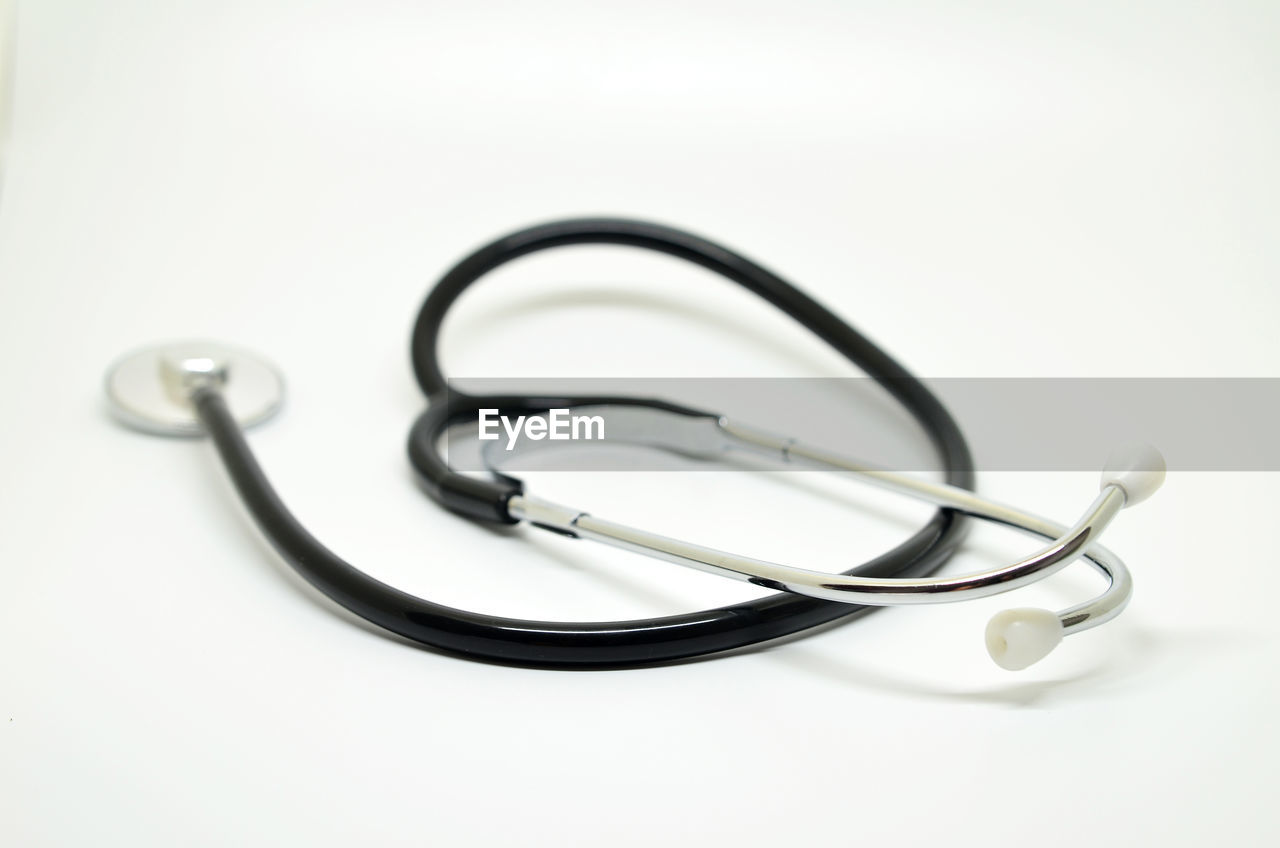 Close-up of stethoscope against white background