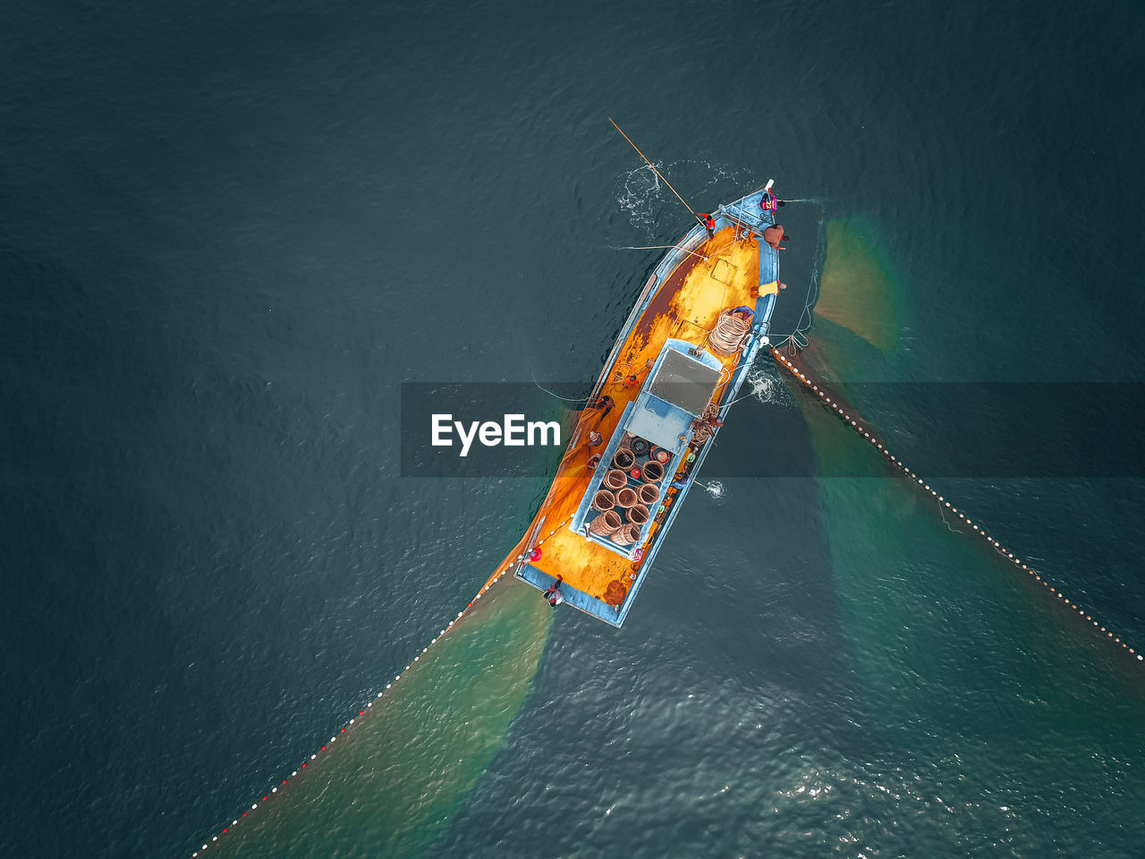 HIGH ANGLE VIEW OF SHIP SAILING ON SEA