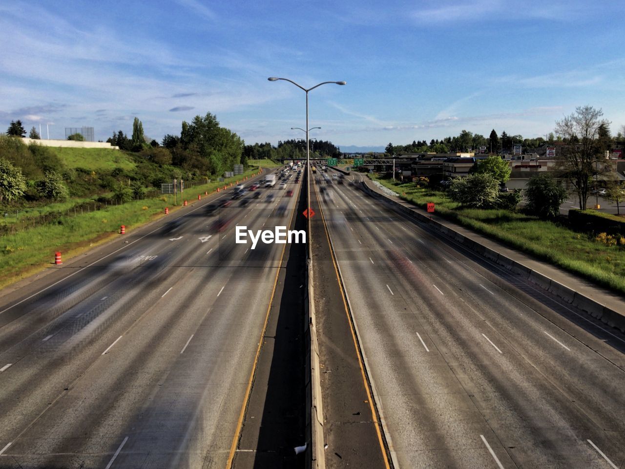 Timelapse view of highway against sky