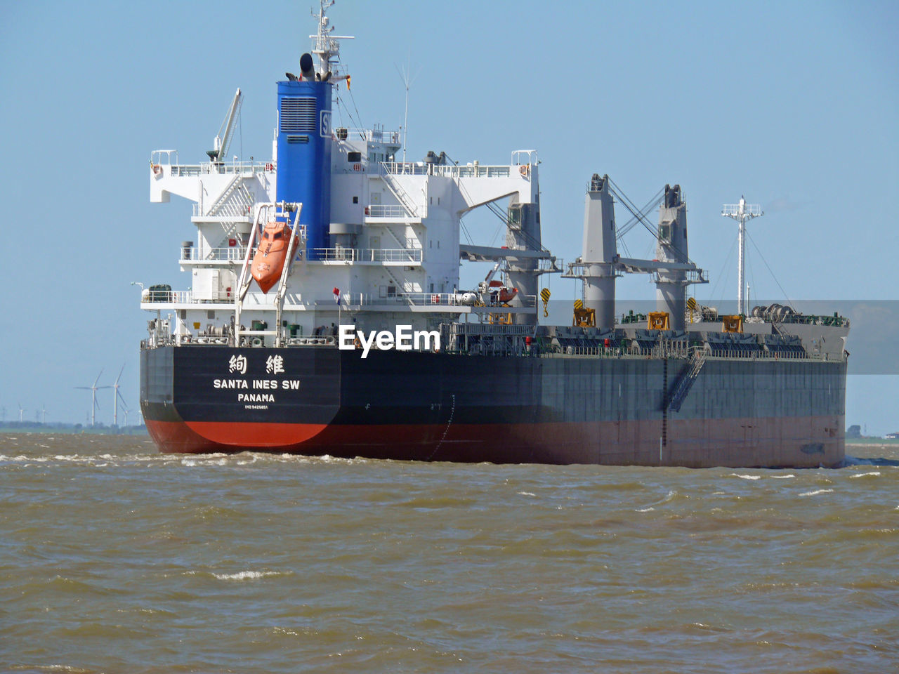 Ship in sea against clear sky