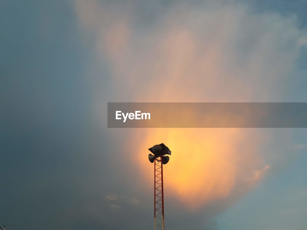 Low angle view of silhouette street light against sky during sunset