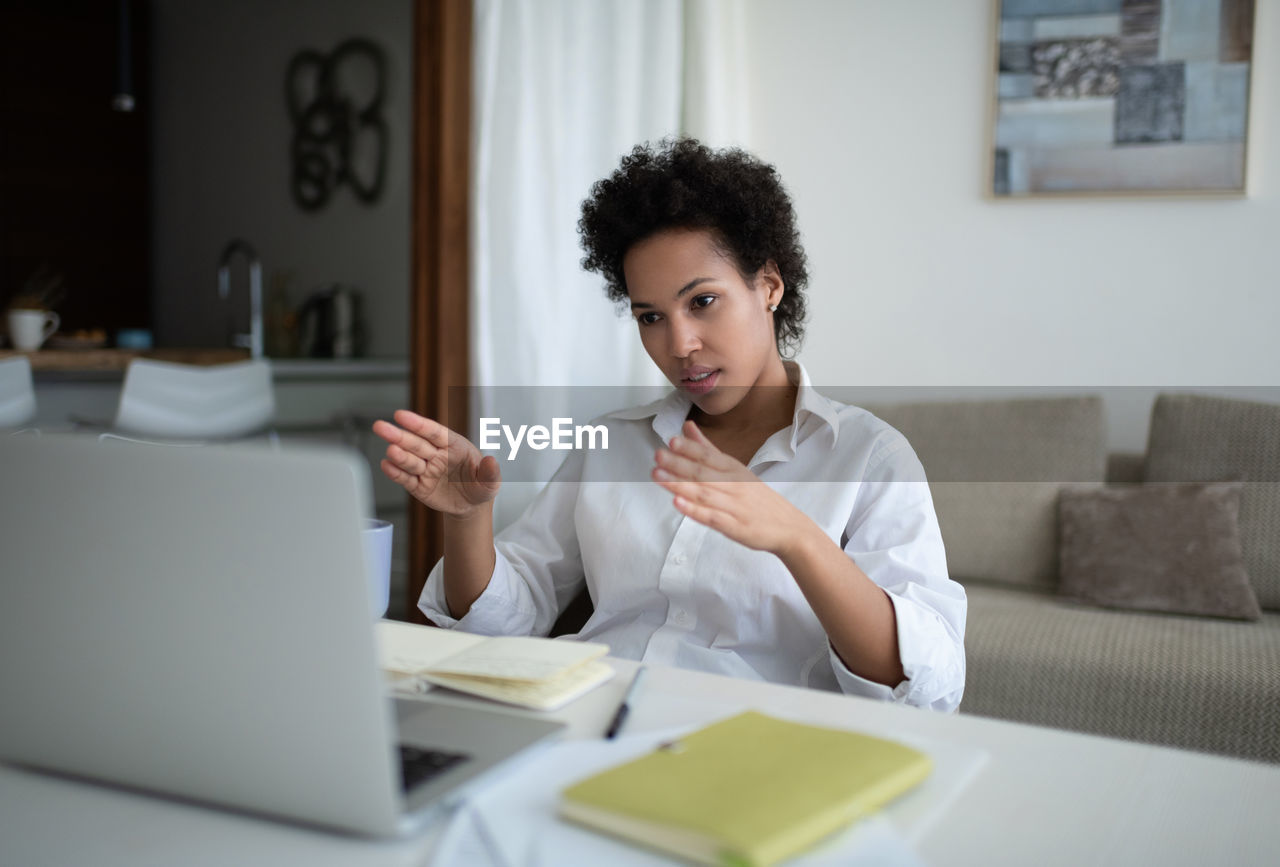 African american freelancer making video call