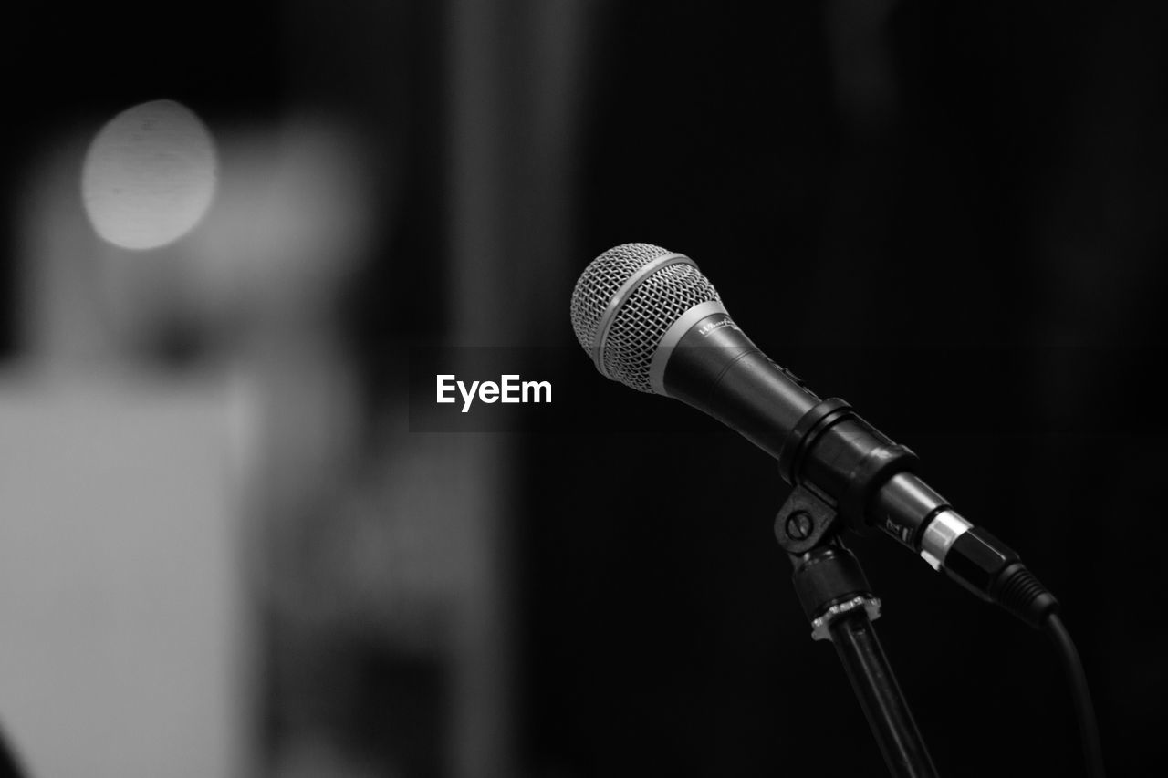 Close-up of microphone in auditorium