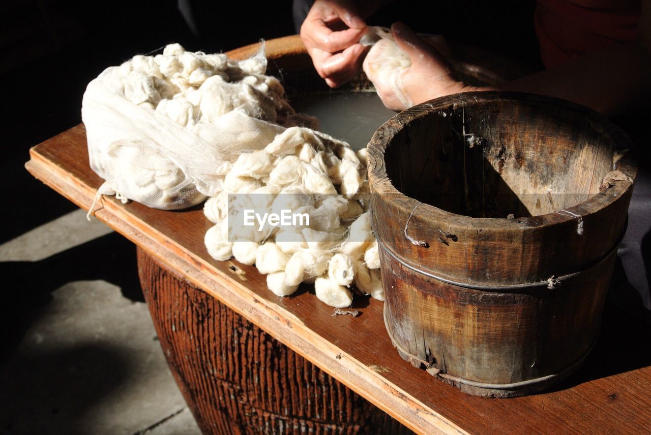 Person cleaning animal intestine