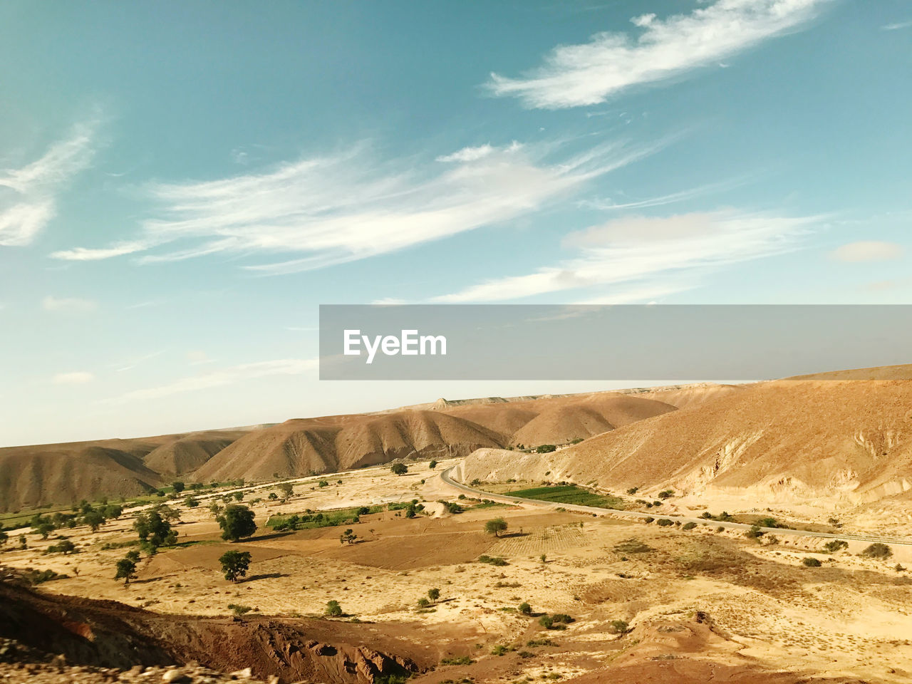 Scenic view of desert against sky