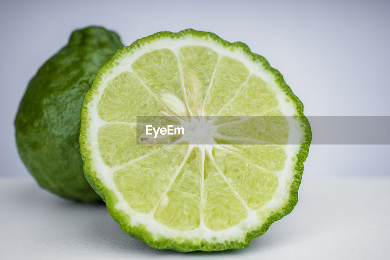 Close-up of   fresh bergamot on white background.