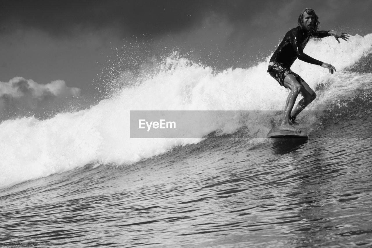 Man surfing in sea