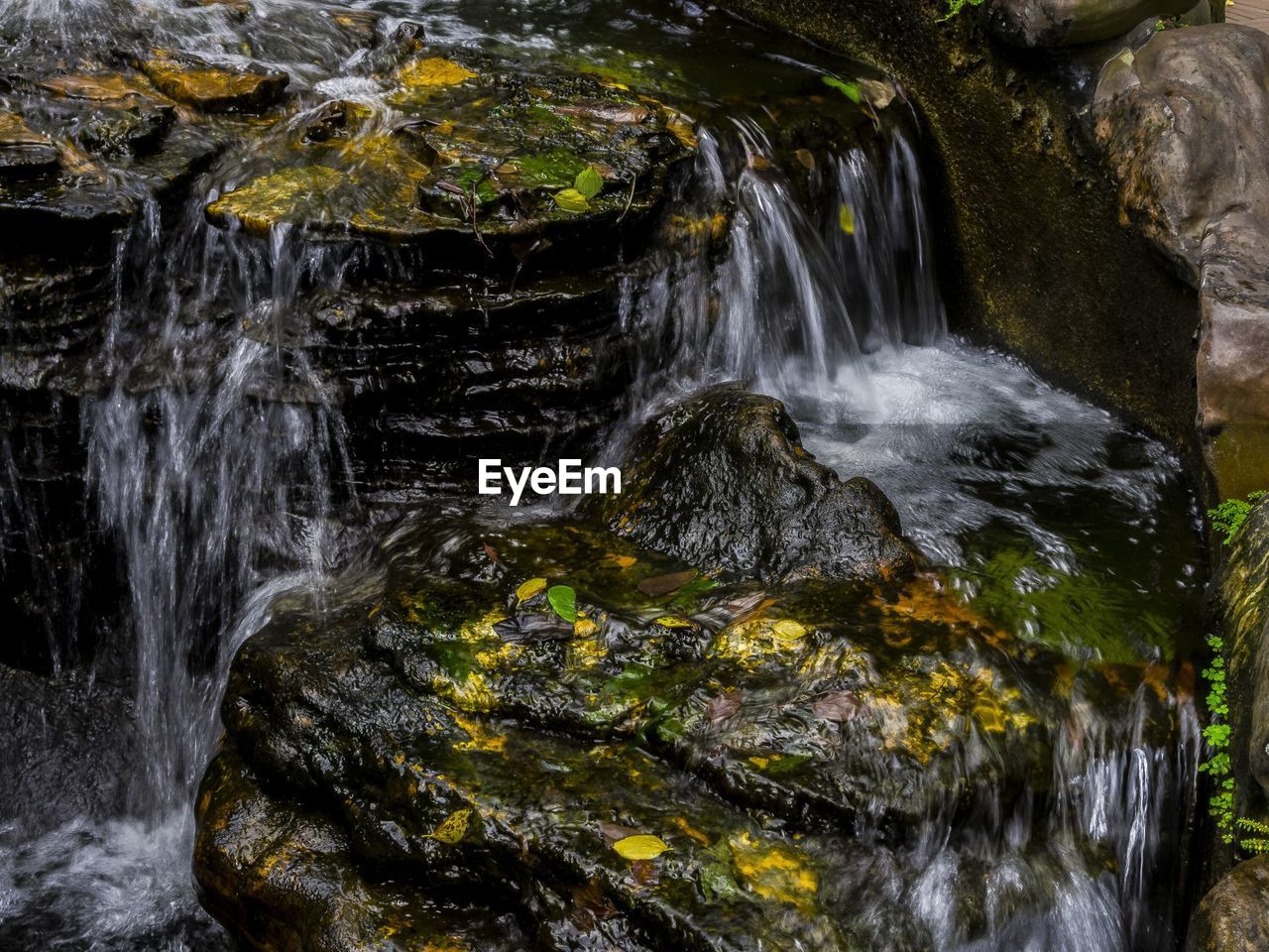 High angle view of waterfall over rocks