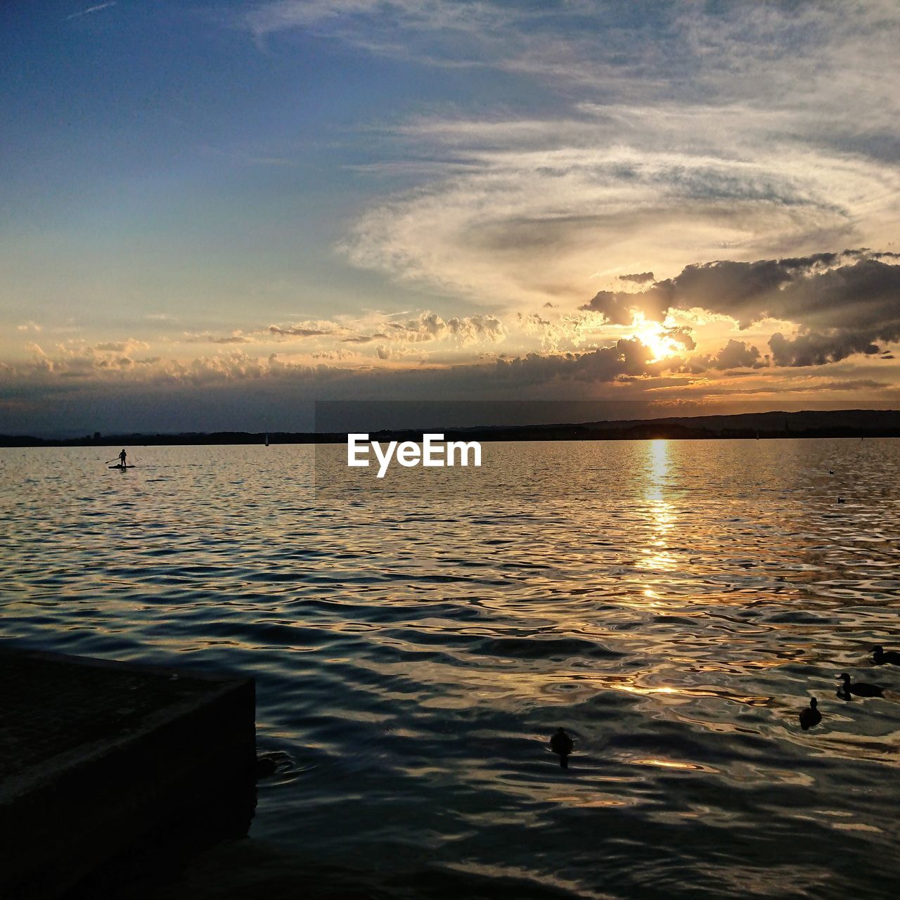 SCENIC VIEW OF SEA DURING SUNSET