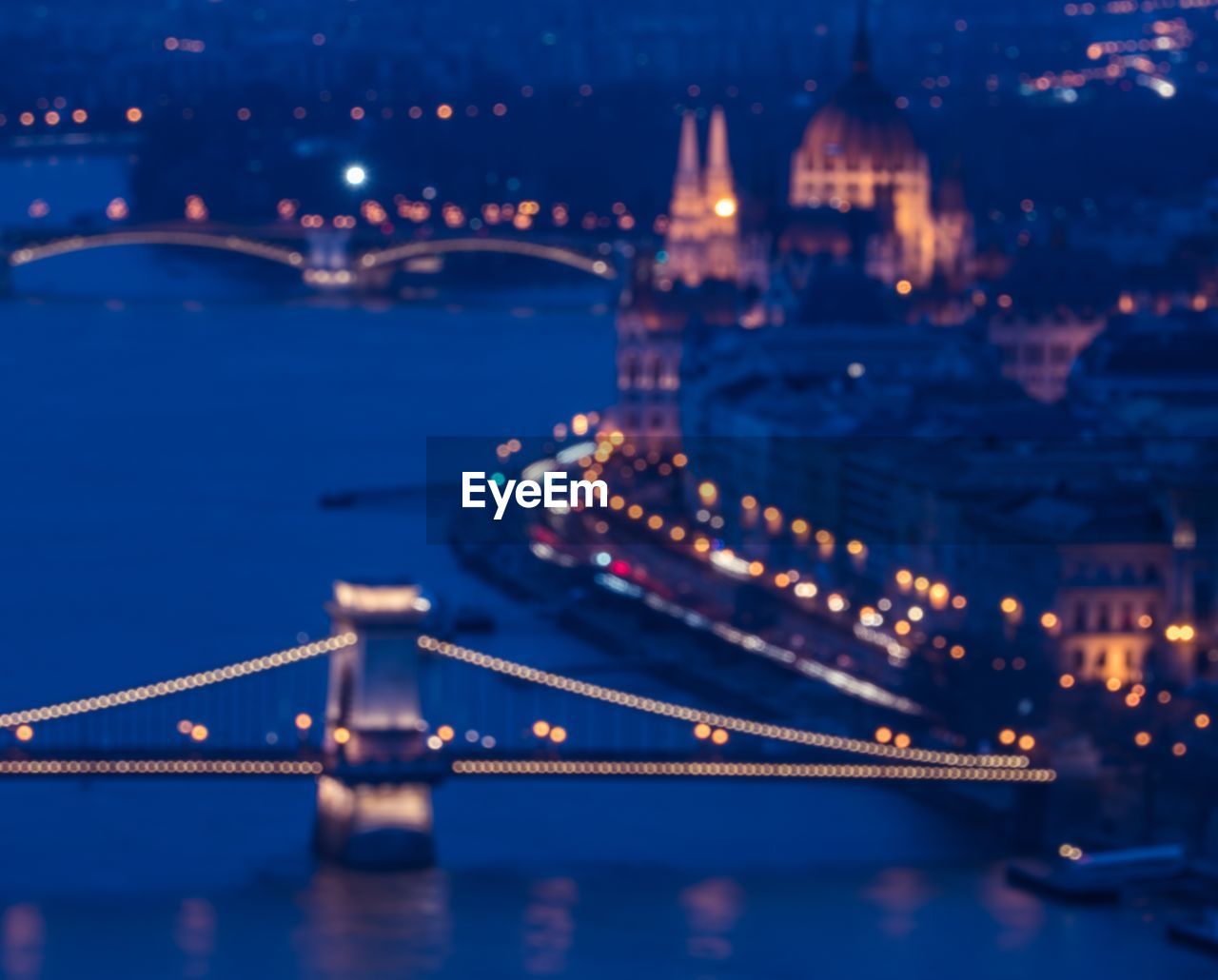 Aerial view of suspension bridge at night