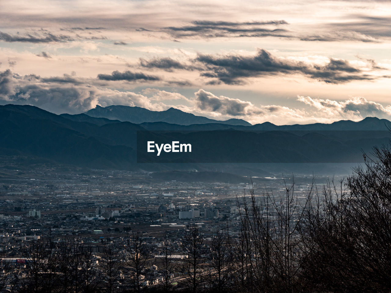 High angle view of cityscape against sky during sunset