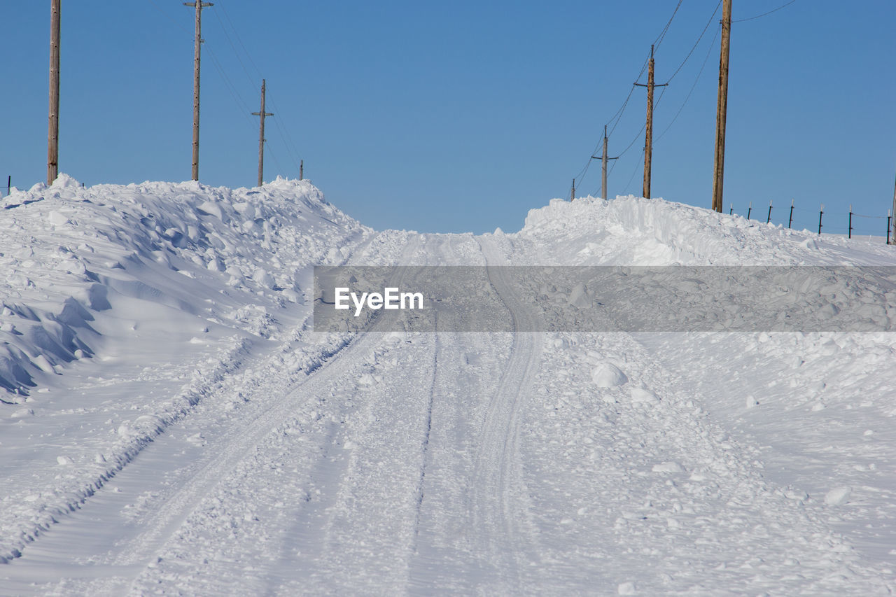 Snow covered country road.