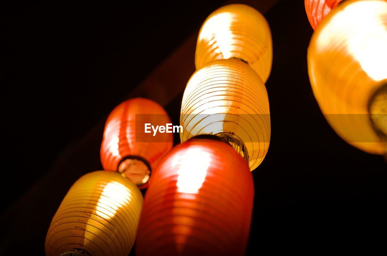 Low angle view of illuminated lantern