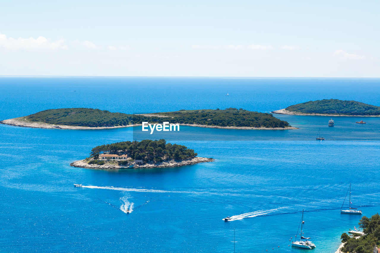 HIGH ANGLE VIEW OF BLUE SEA