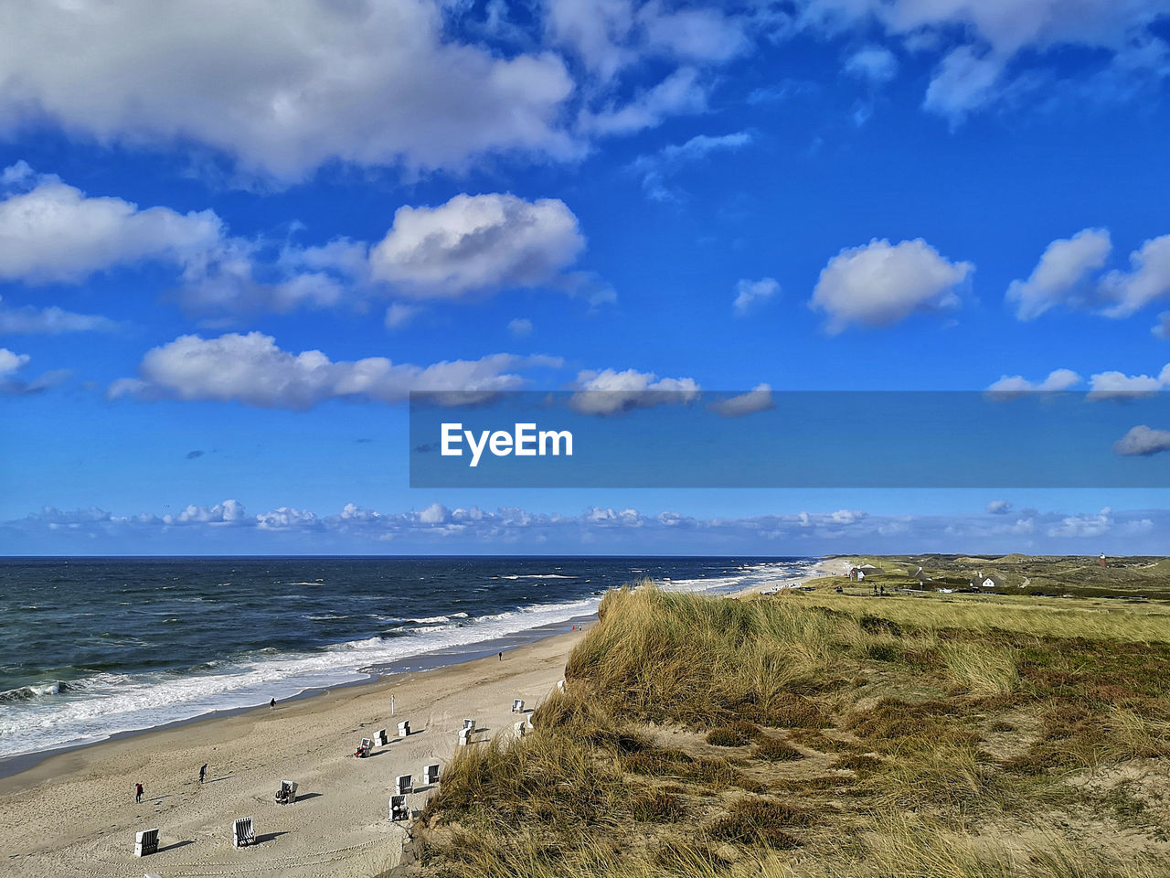 Scenic view of beach against sky