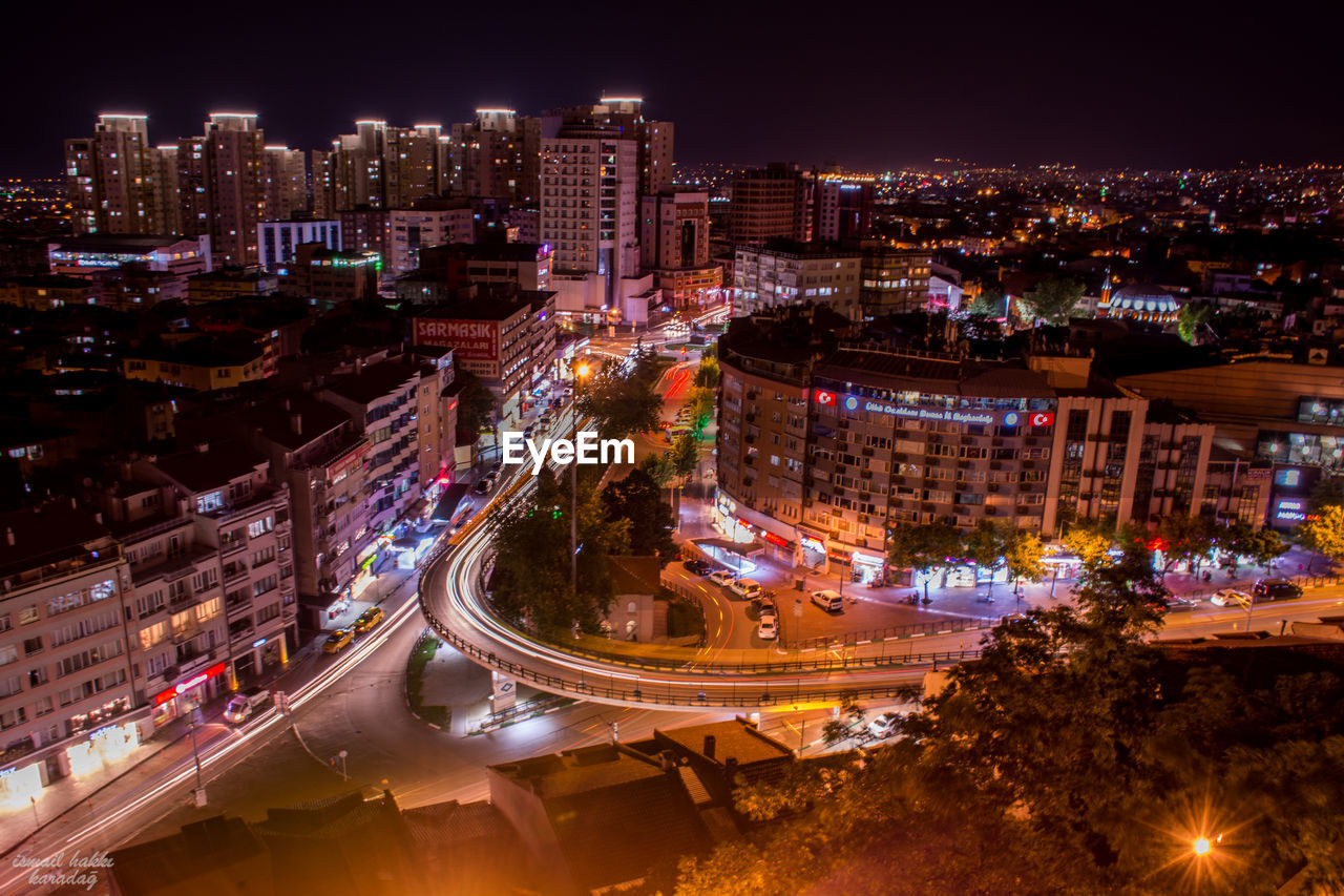 High angle view of illuminated cityscape at night