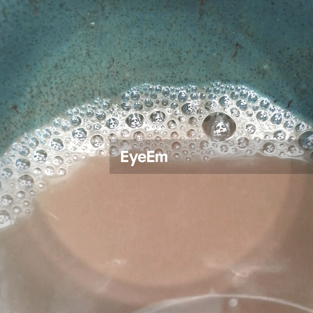 Close-up of froth on coffee