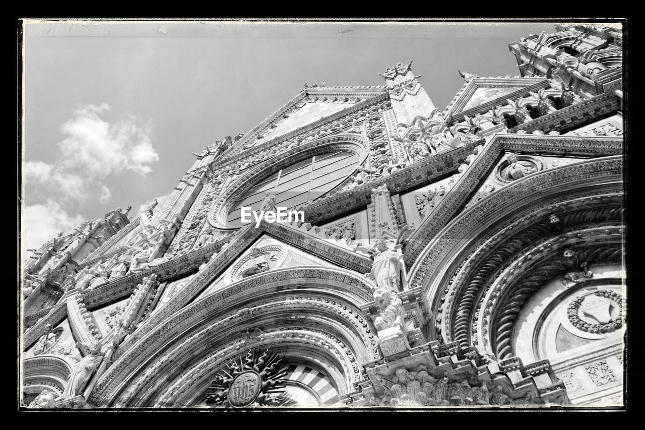 LOW ANGLE VIEW OF TEMPLE AGAINST SKY