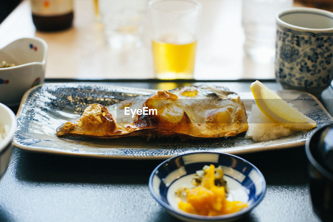 CLOSE-UP OF FOOD ON TABLE