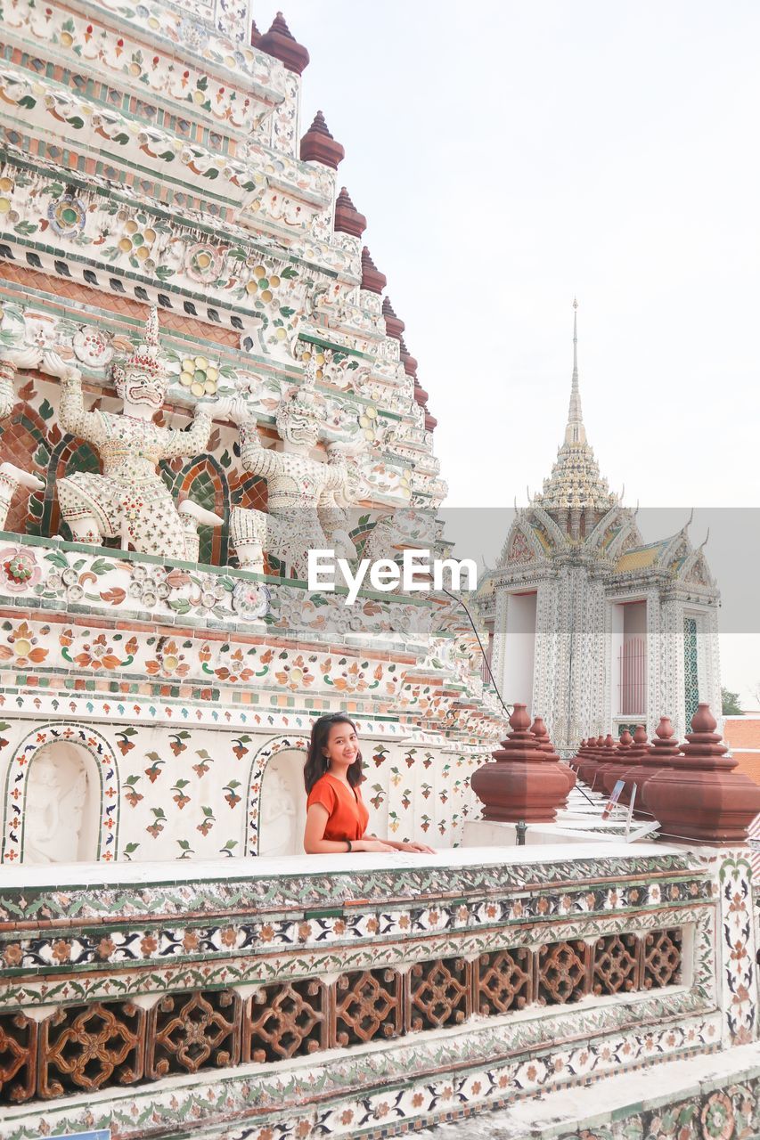 Beautiful symetry of the tample with a lady