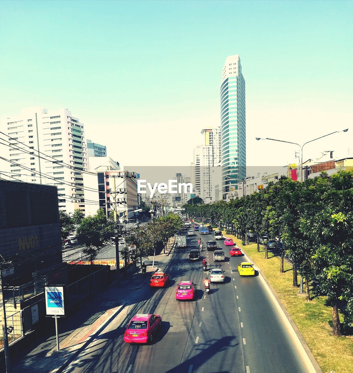 CARS ON ROAD AGAINST SKY