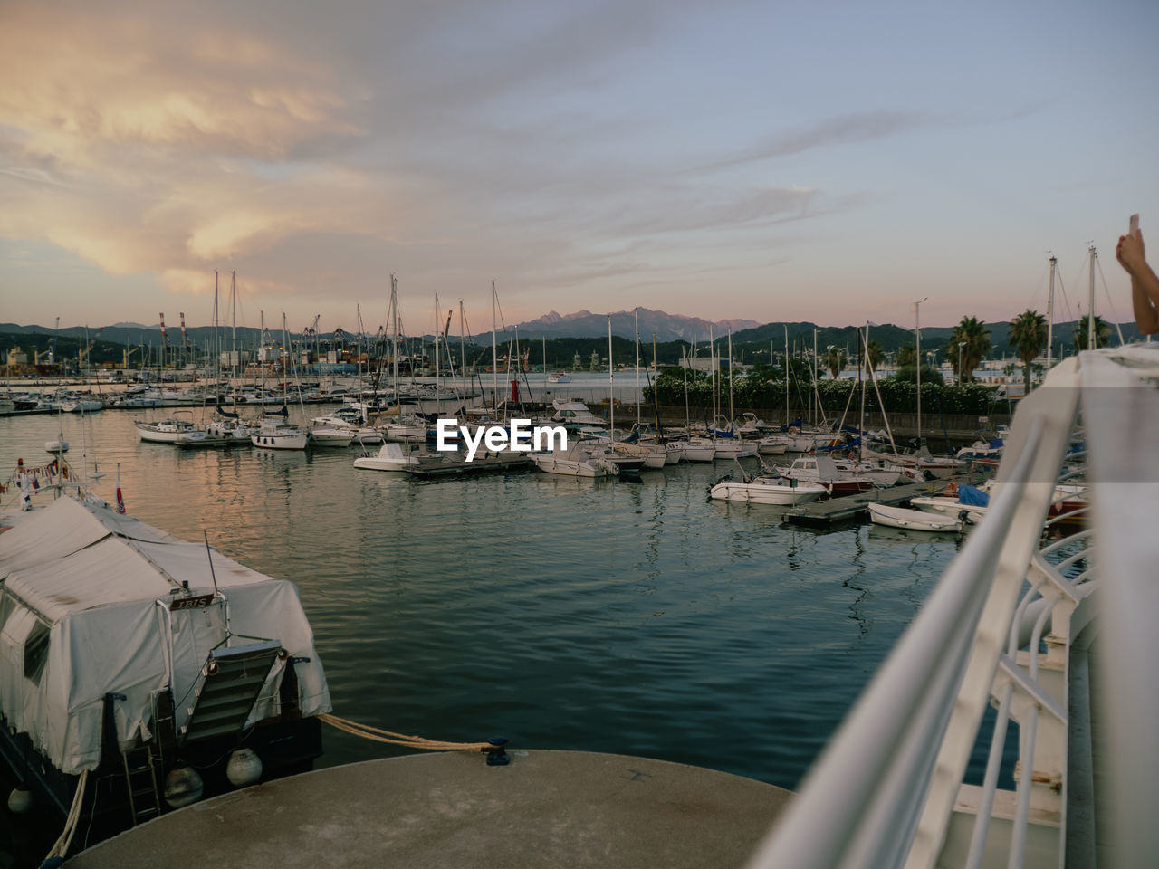 water, nautical vessel, transportation, mode of transportation, sky, marina, sea, ship, harbor, dock, moored, sailboat, nature, vehicle, boat, cloud, travel, architecture, travel destinations, yacht, no people, sunset, mast, beauty in nature, holiday, pier, watercraft, vacation, tranquility, outdoors, trip, tourism, pole, building exterior, city, scenics - nature, reflection, built structure, sailing, day, beach, tranquil scene, bay