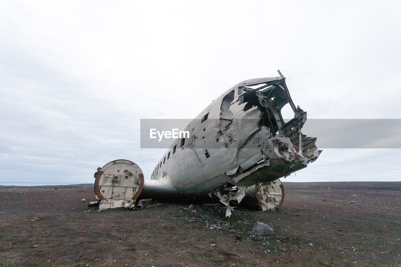 ABANDONED AIRPLANE ON FIELD